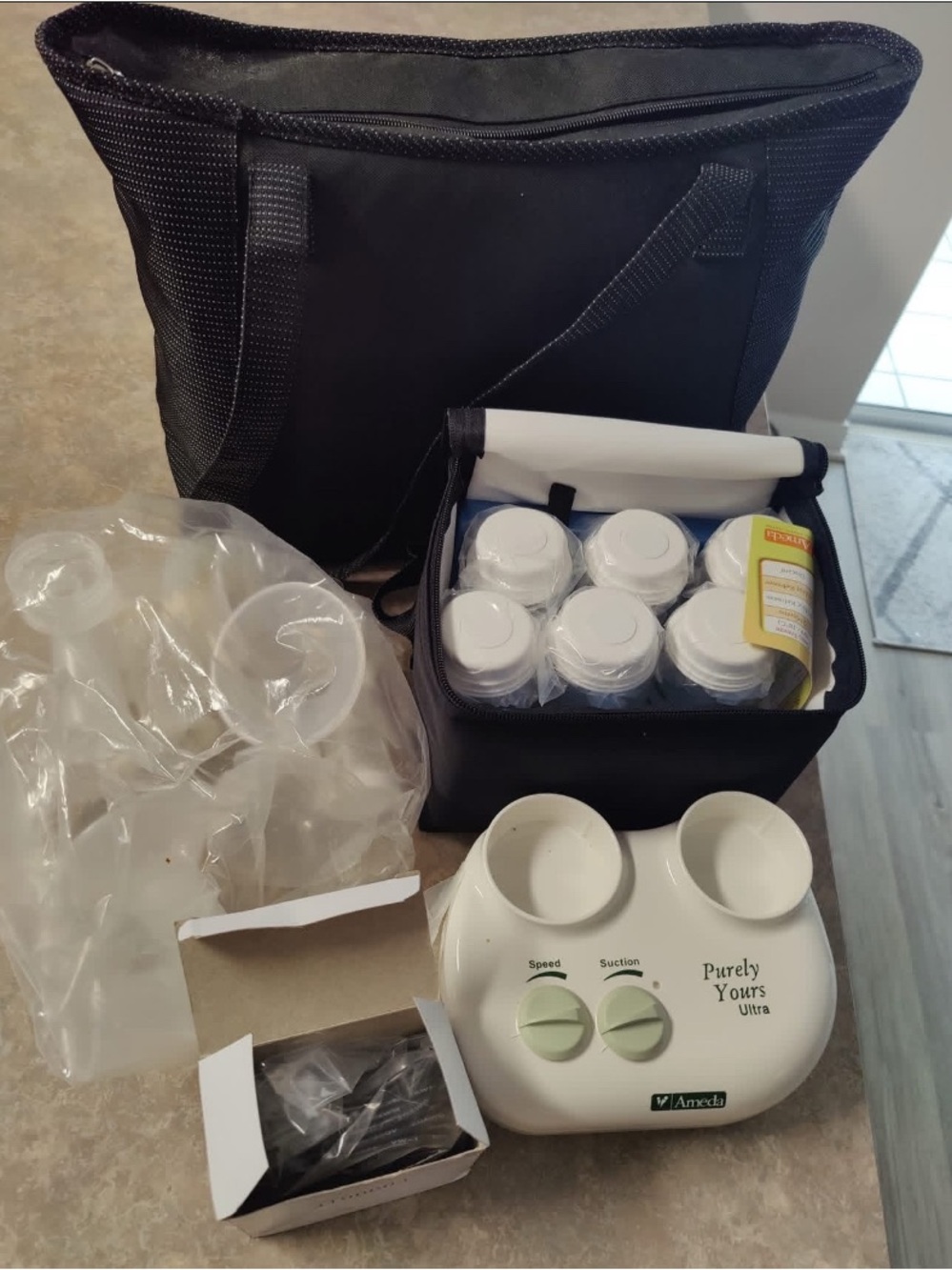 Ameda Purely Yours Ultra Breast Pump Set in White and Black